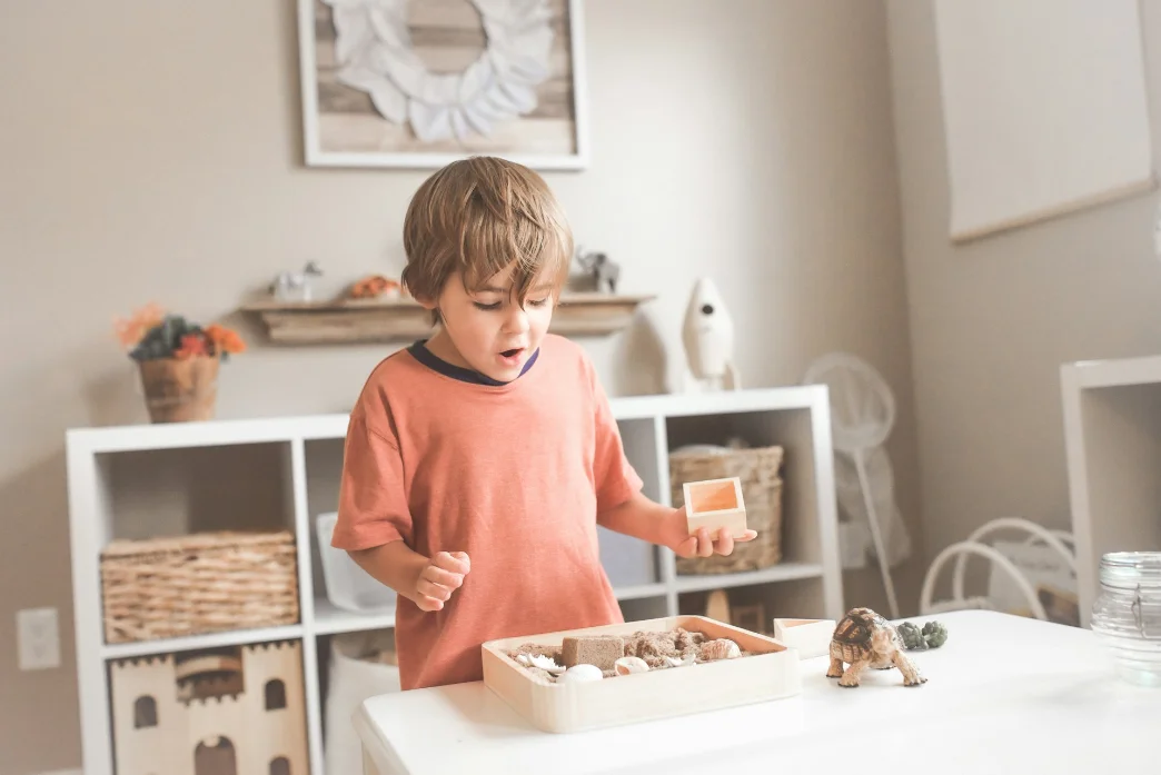 A child playing during an at-home speech therapy session